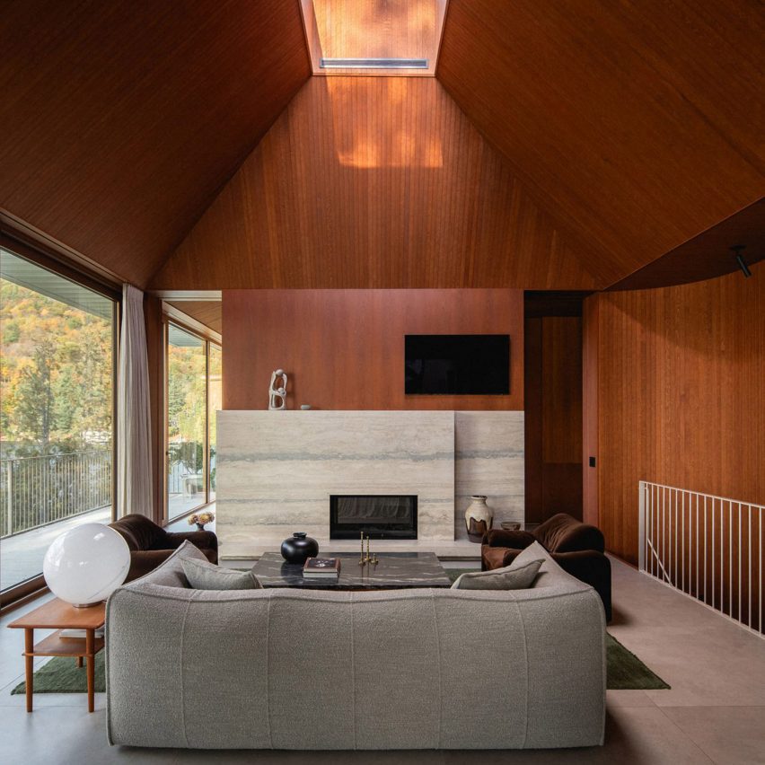 Eight living room interiors warmed by wood-clad ceilings