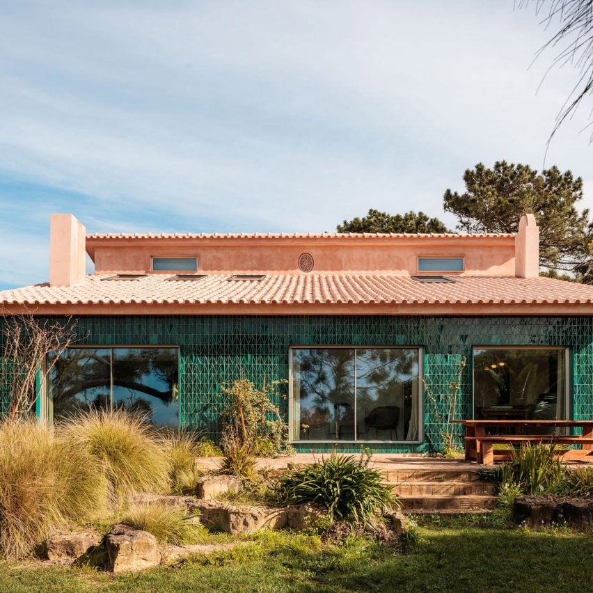 Joāo Tiago Aguiar Arquitectos converts Portuguese windmill into coastal guesthouse