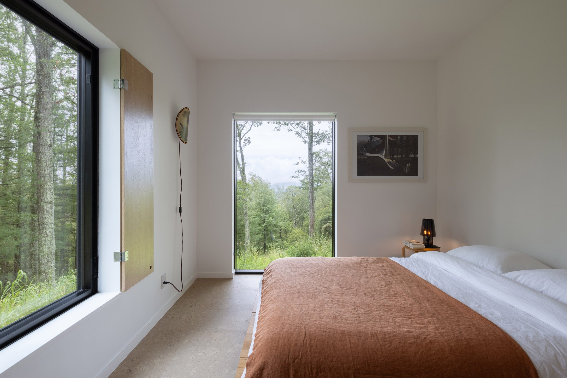 Large windows in a bedroom