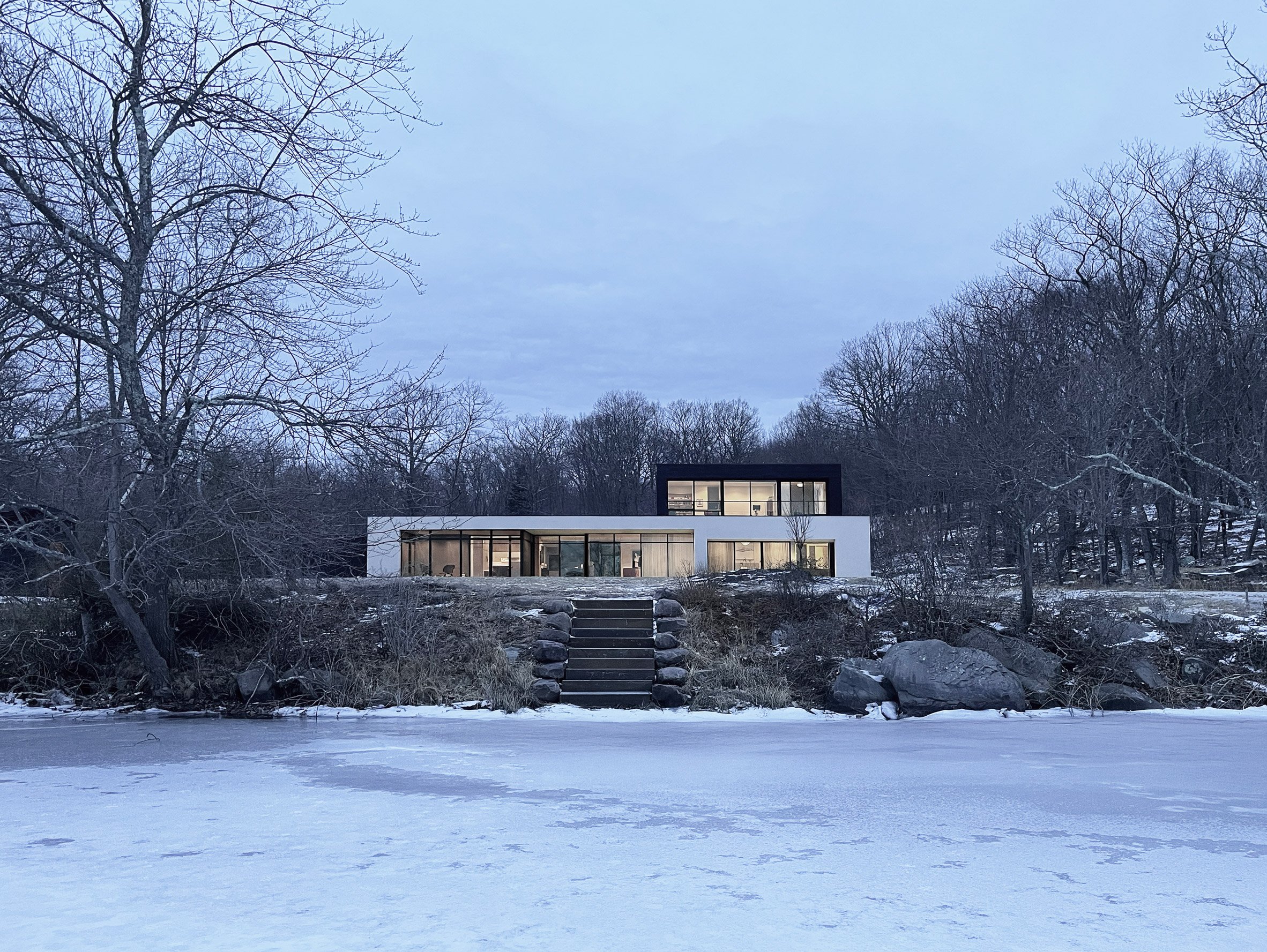 Log Tavern Pond House by Specht Novak Architects