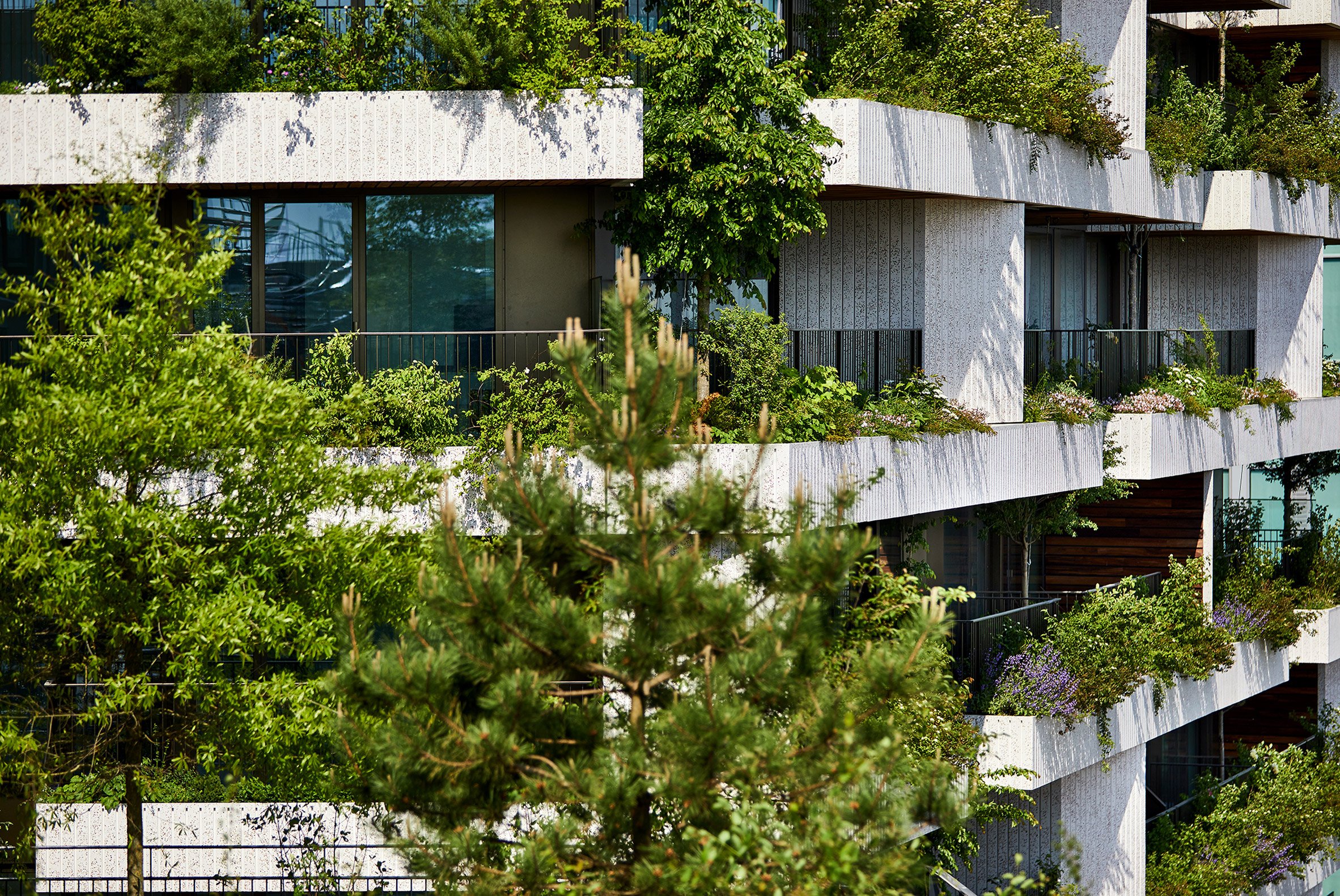 Close-up view of the Wonderwoods Vertical Forest by Stefano Boeri Architetti