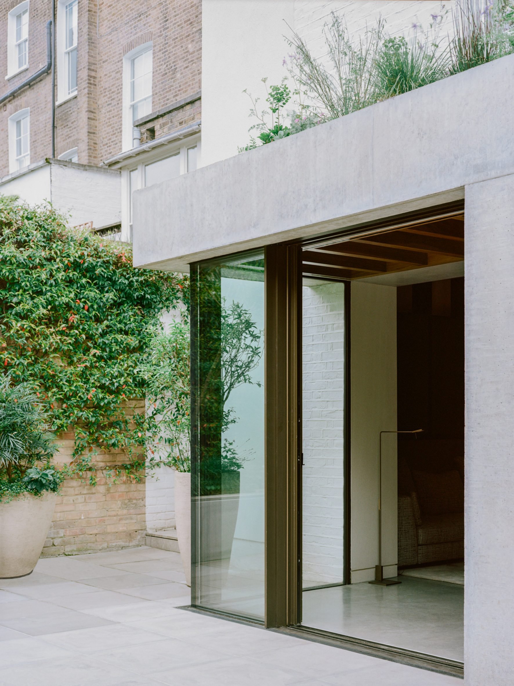 Concrete extension at T House in London by DF_DC