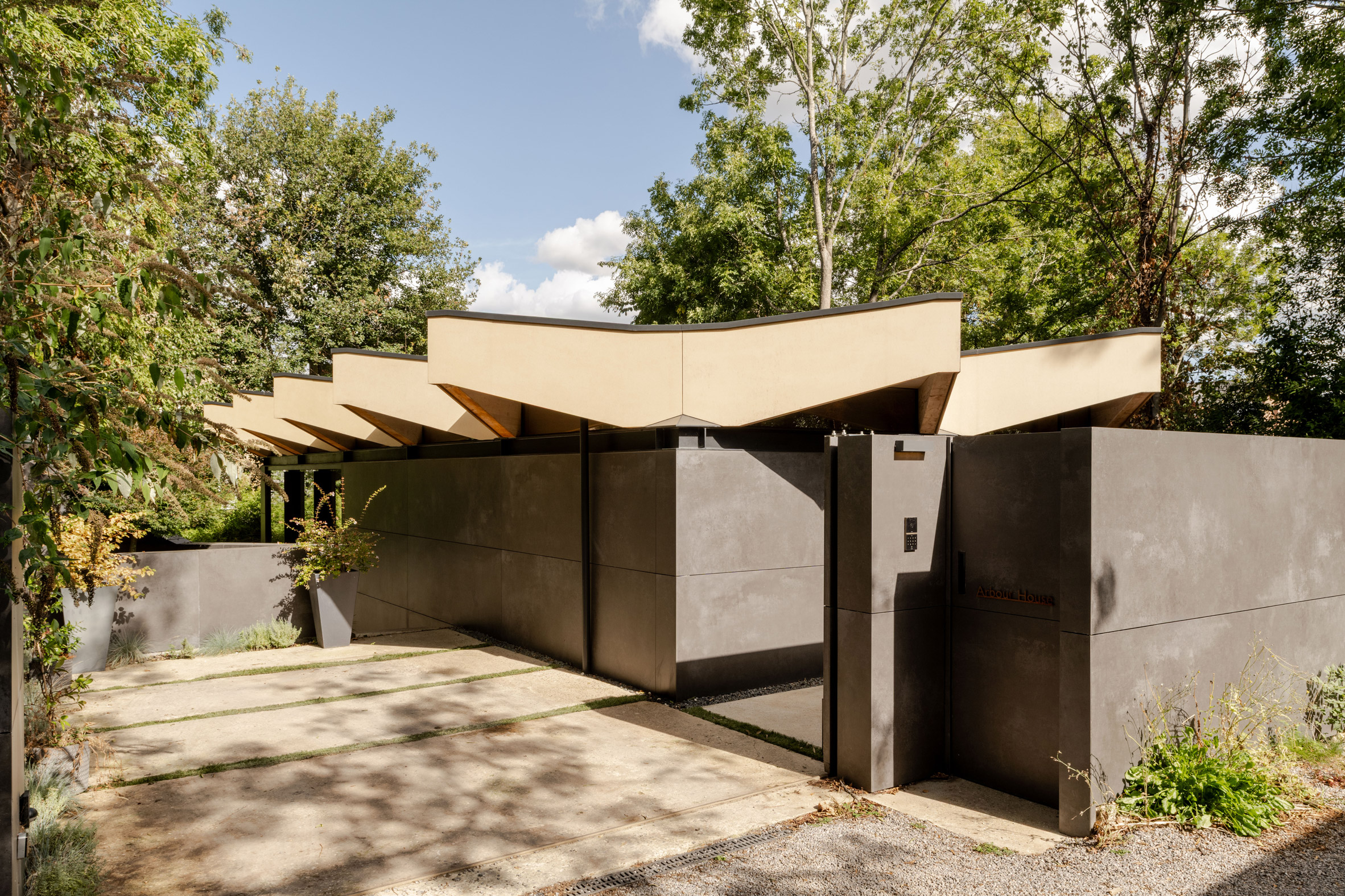 Overhanging triangular eaves of Arbour House by Andrei Saltykov
