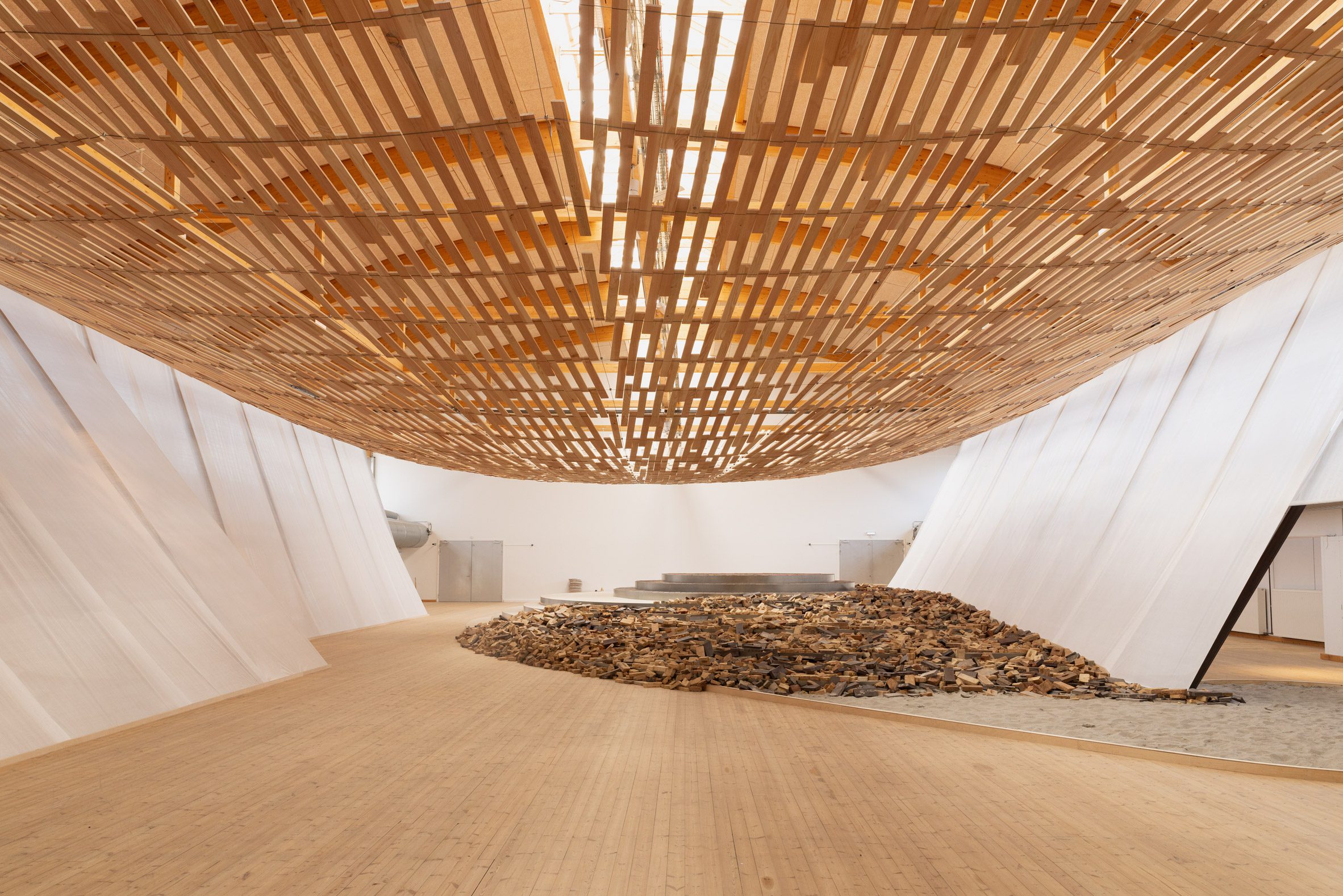 Hall with wooden floor and ceiling