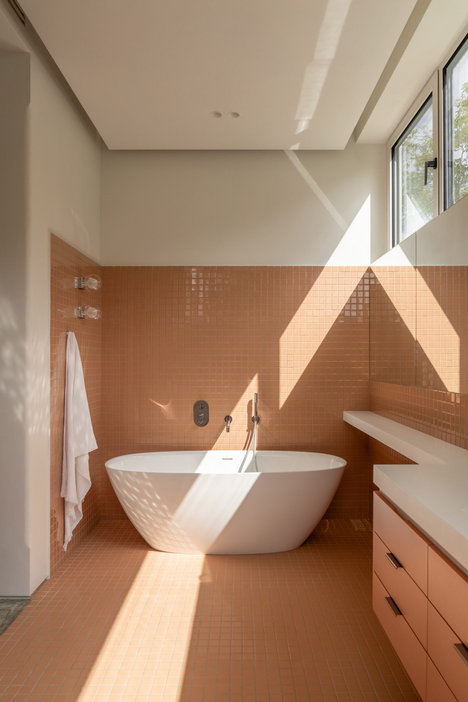 Coral-tiled bathroom