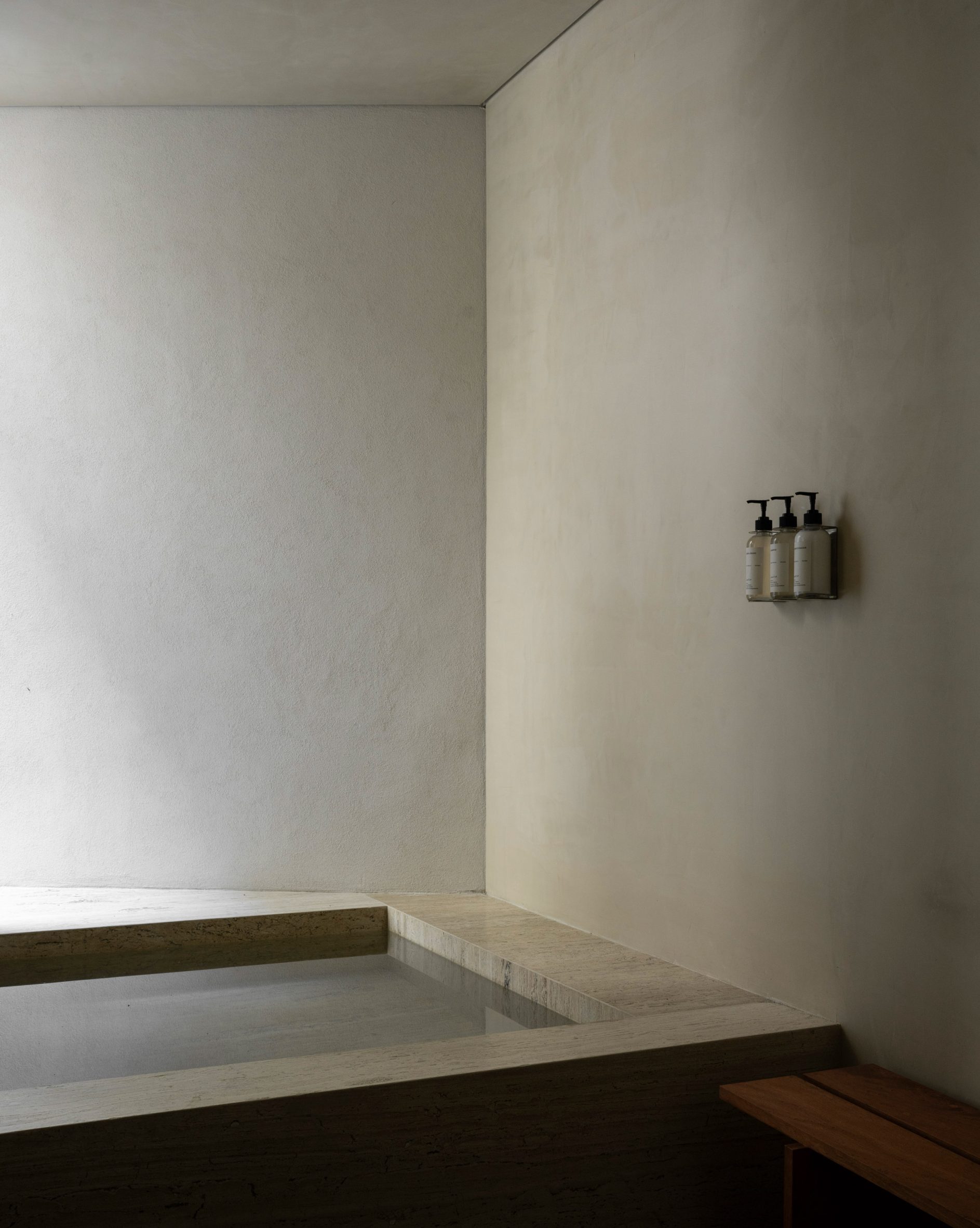A large soaking tub in a hotel suite