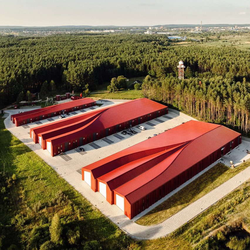 Sweeping roofs top bright red logistics hub in Ukraine by Aranchii Architects