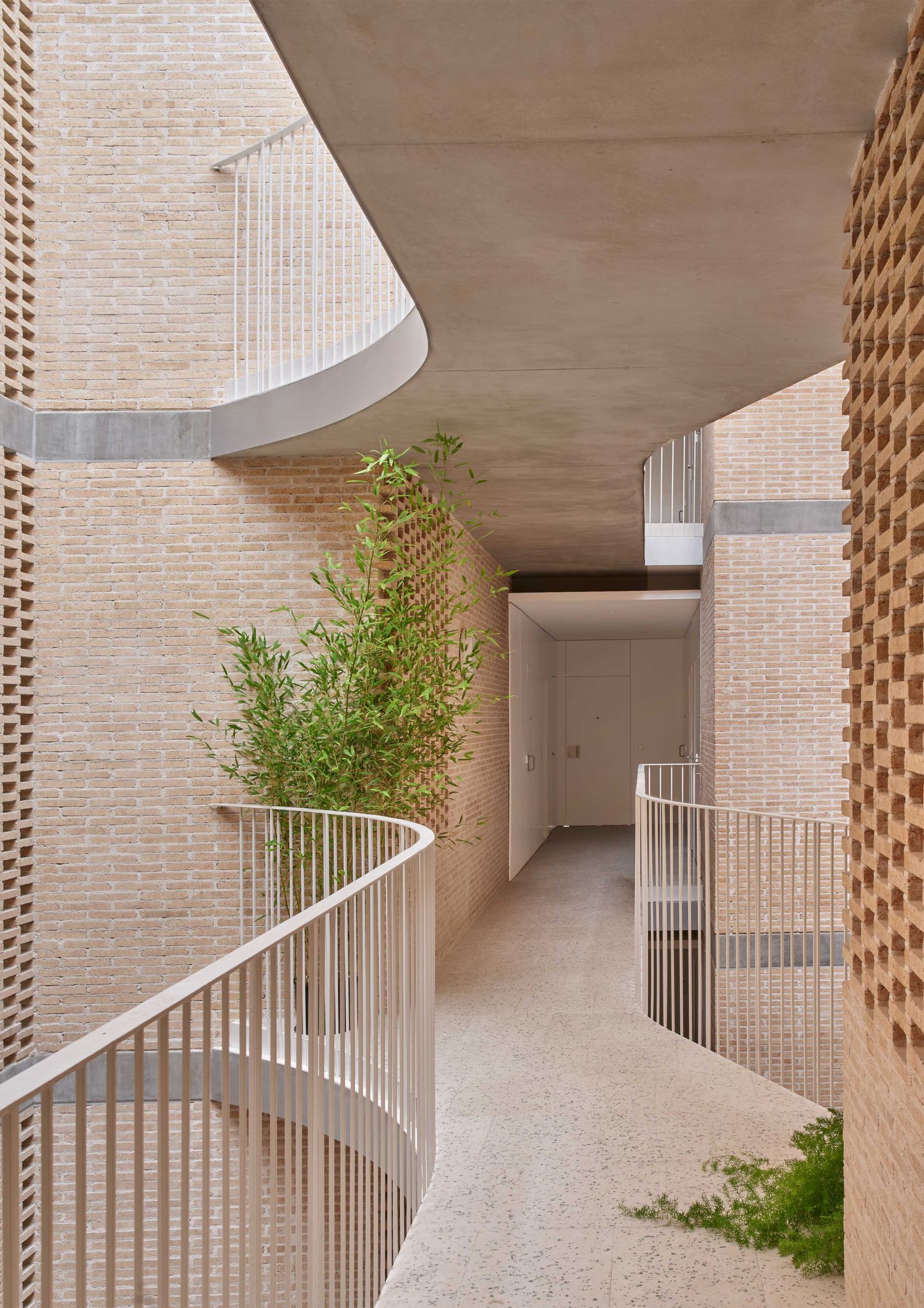 Neutral brick apartment hallway